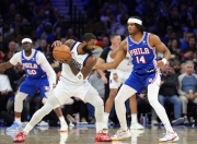 雷火电竞网站-76人完胜深圳队，欧文统治全场